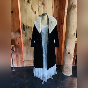 Knee length black fur coat